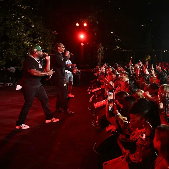 MPTF's tweet photo. This year's Paris @Olympics has been a spectacular show, and one highlight  has been the incredibly entertaining @snoopdogg! Here's a throwback to his performance with MPTF Board member @50cent at the 2022 #EveningBefore, which really brought down the house! https://t.co/BUDATFPBzj