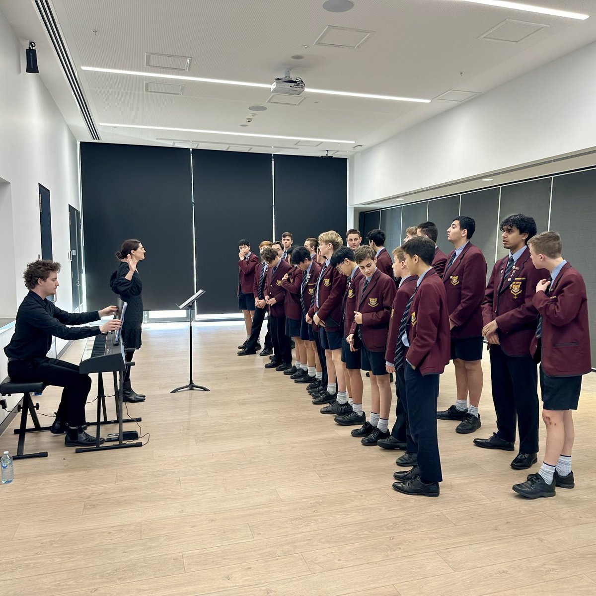 Marcellin's tweet photo. Final preparations for our choir before competing at the Victorian School Music Festival. VSMF involves school bands, orchestras, jazz ensembles and choirs in performing in some of Victoria’s premier performing spaces. Good luck to all involved!
#choir #ensemble #VSMF #music https://t.co/EZsH3WhGGU