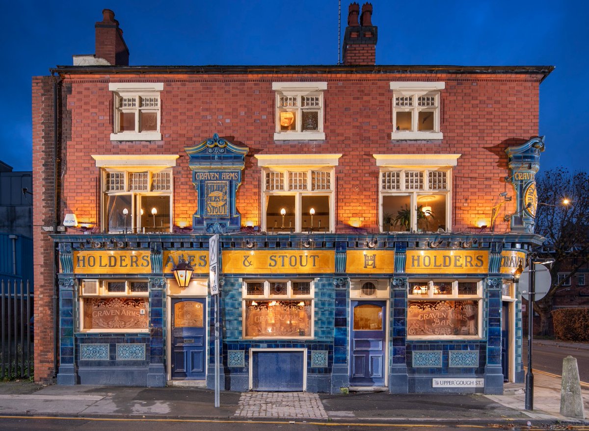 ichoosemag's tweet photo. GOOD NEWS: Birminghamโs Craven Arms pub has been listed at Grade II.
The City Centre boozer, featuring a striking two-tone tiled exterior, has been recognised as a building of exceptional national interest.
Designed between 1906-1910 and attributed to local architect Arthur Edwards, the ground floor of the building is faced with moulded and glazed ceramic tiles while the upper floors are of red brick. The windows are timber framed.
Edwards is also thought to have been responsible for the building occupied by OโNeillโs on Broad Street.
A pub has existed on the corner of Upper Gough Street and Blucher Street near Holloway Head since at least the 1840s, when the first licensee of the Craven Arms was recorded.
As industrial areas developed on the rural fringes of Birmingham in the early 19th century, the construction of new factories and workersโ houses lead to the establishment of public houses, which served the local working communities.
By the 1970s most of the workersโ houses surrounding the Craven Arms had been demolished. The two adjoining properties on Blucher Street, including the ground floor shop survived until at least 1971, after which time they were also demolished.