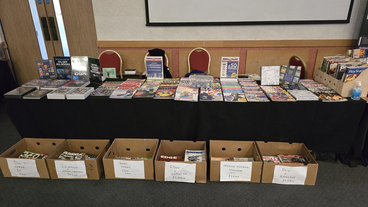 SegaMags's tweet photo. This time next week SegaMags is at @TimelessGC for the first time! 

All mags £2-£5 each.

A huge selection of gaming books from Bitmap, Ninty Media and Pen And Sword, all at show exclusive prices!

Cash or card accepted.

Free sweets.

See you there!

#timelessgamingconvention https://t.co/u4I8bEQAo4