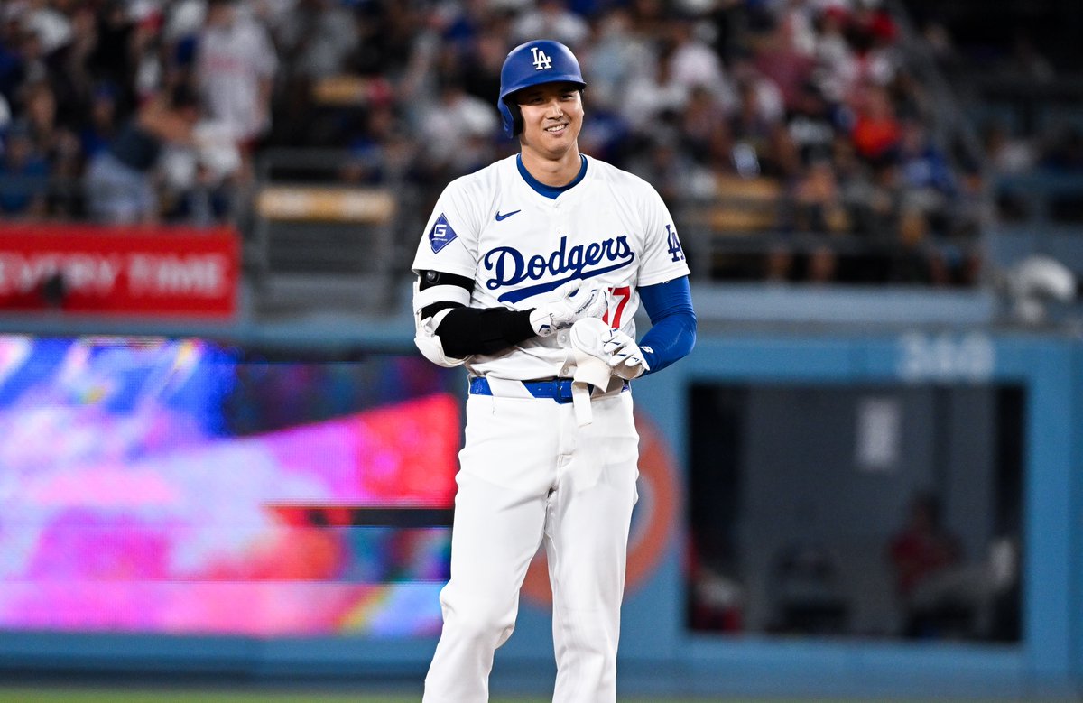 DodgersNation's tweet photo. Shohei Ohtani has the chance to be:

- The first MVP in both MLB leagues since Frank Robinson
- The first MVP as a primary DH
- The first player to record a 50-50 season 
- The first Triple Crown winner since Miggy Cabrera

ALL IN YEAR 1 WITH THE DODGERS 🤯 https://t.co/8x405GvrFE