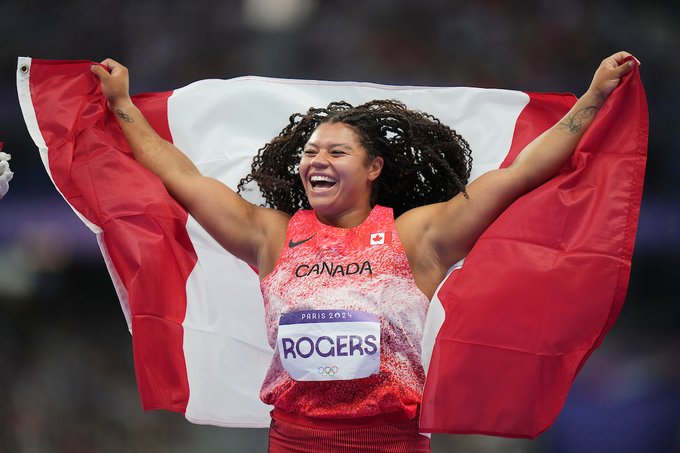 Camryn Rogers celebrates winning gold in hammer throw during the 2024 Paris Olympics Games.