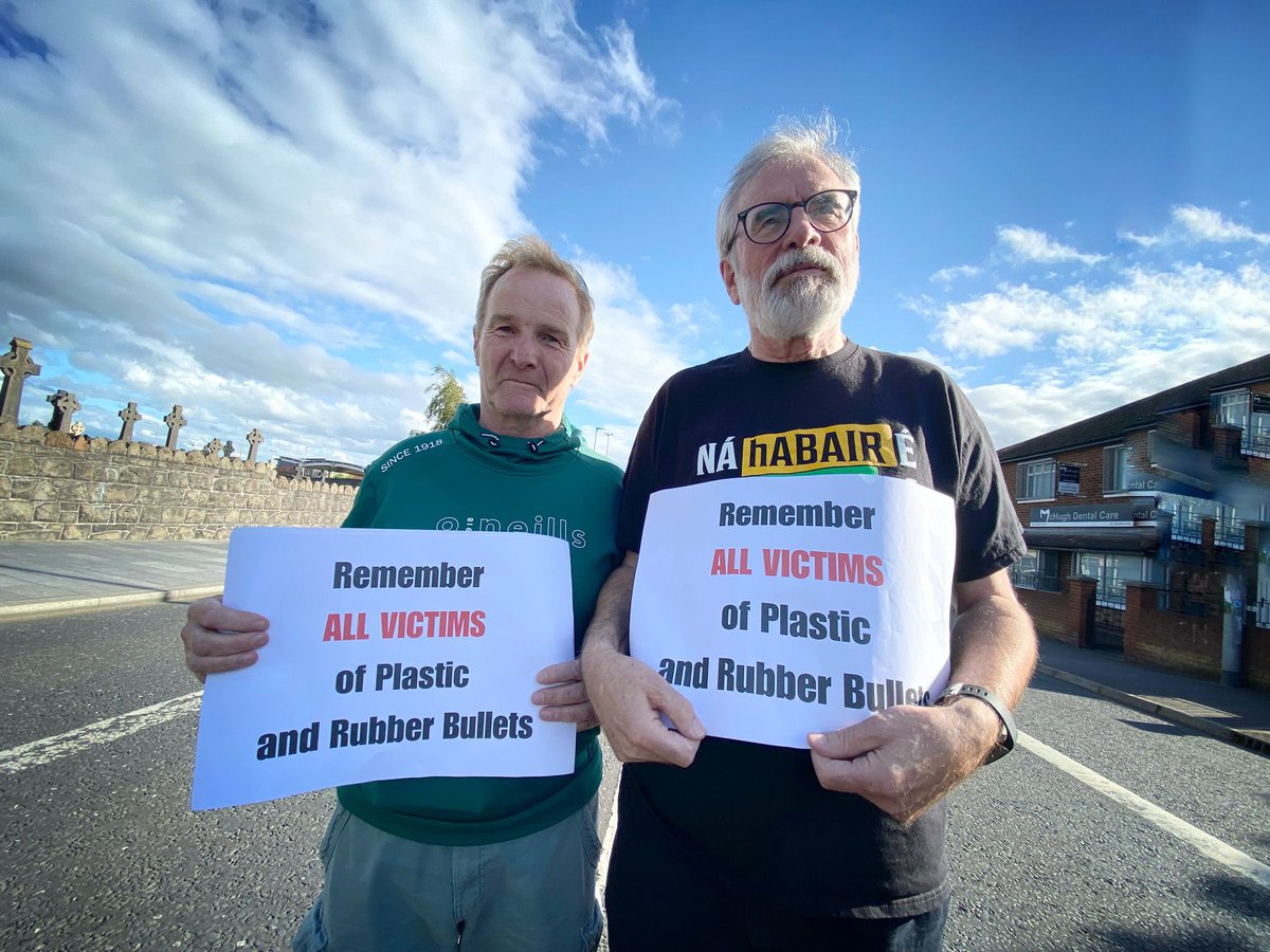 FeileBelfast's tweet photo. Féile an Phobail founder @GerryAdamsSF and Councillor JJ Magee at this evenings White Line Picket at the former Andersonstown RUC barracks site to remember all victims of plastic and rubber bullets. https://t.co/ppWL67sMDF