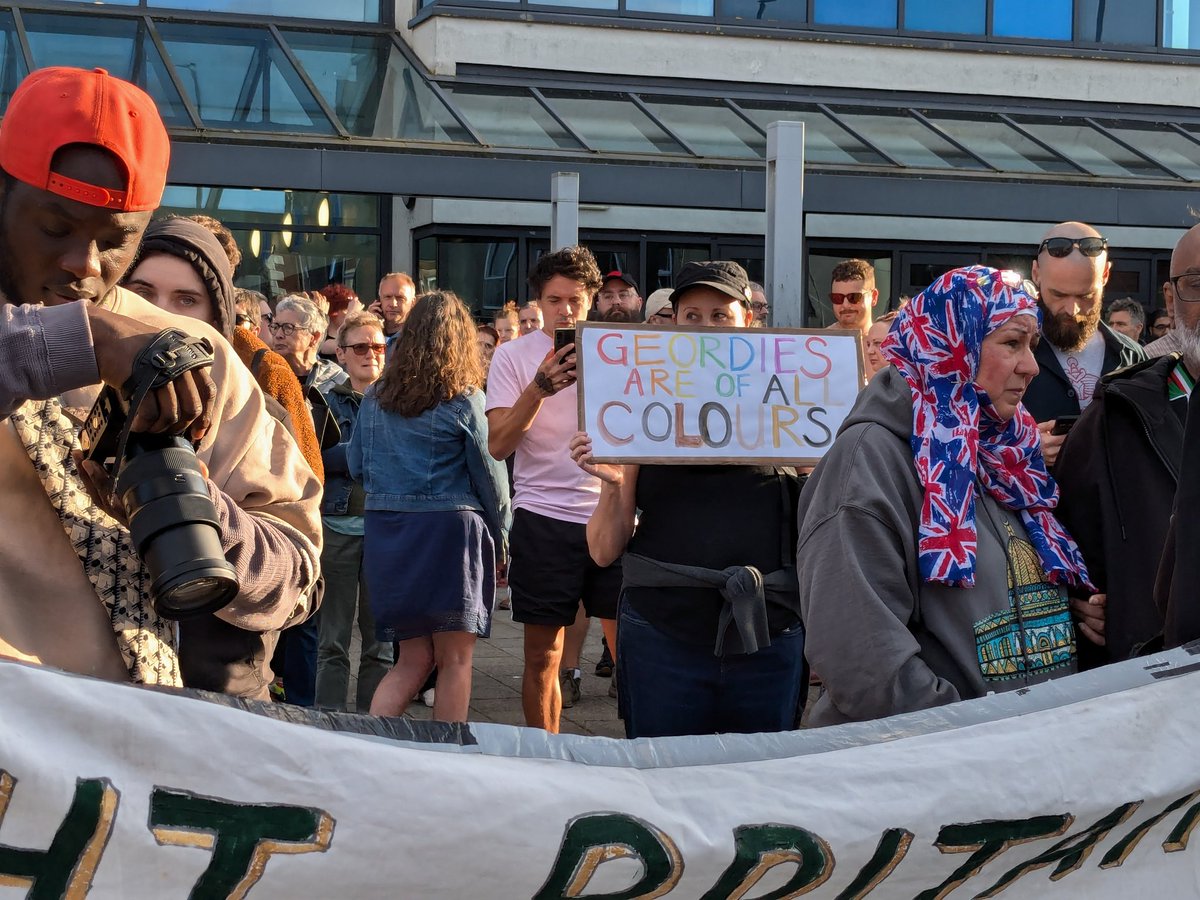 Sounds like police reckon the counter demonstration has upwards of 800 people here. This sign sums up much of the feeling here, currently. 
<a href="/ChronicleLive/">The Chronicle</a>