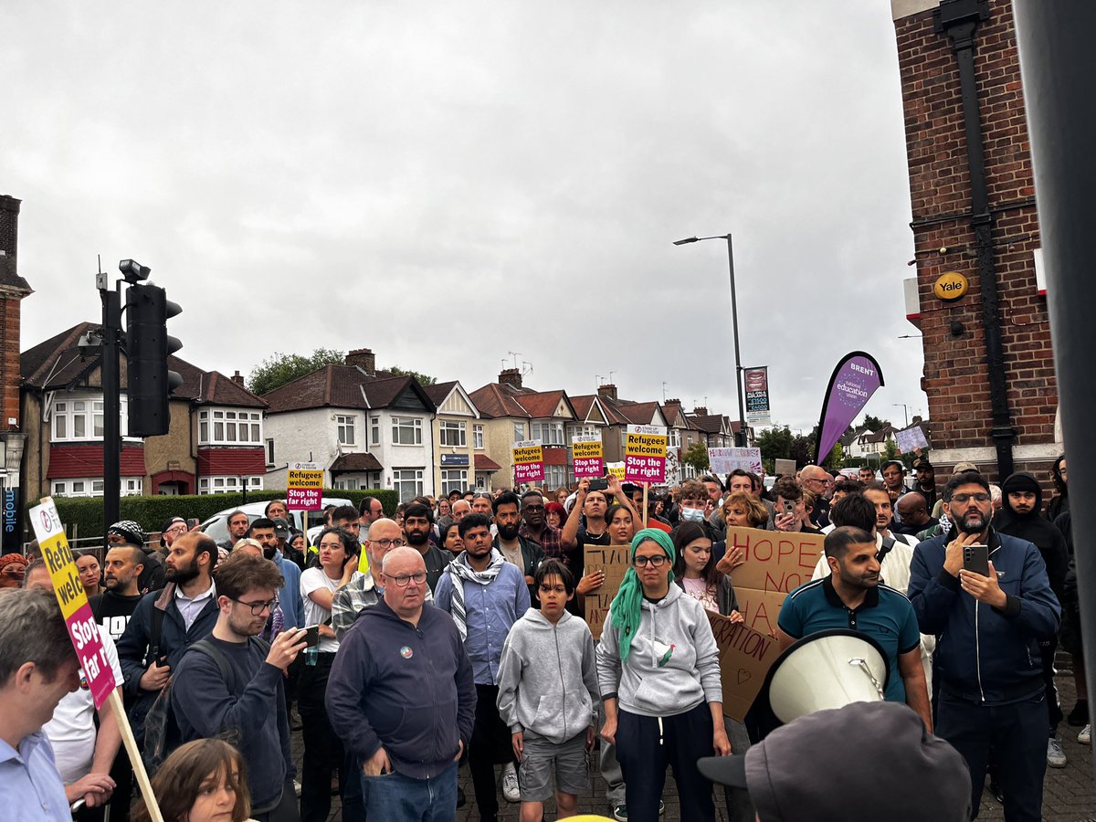 ShabbirLakha's tweet photo. Huge turnout in Harrow to stop any possibility of the fascists passing or attacking Muslims, refugees or lawyers who represent them. Lots of Kuffiyehs and Palestine flags. Harrow is anti-fascist and it’s anti-Zionist.
#StopTheFascists #NoToIslamophobia #FreePalestine https://t.co/S65j6oLSbO