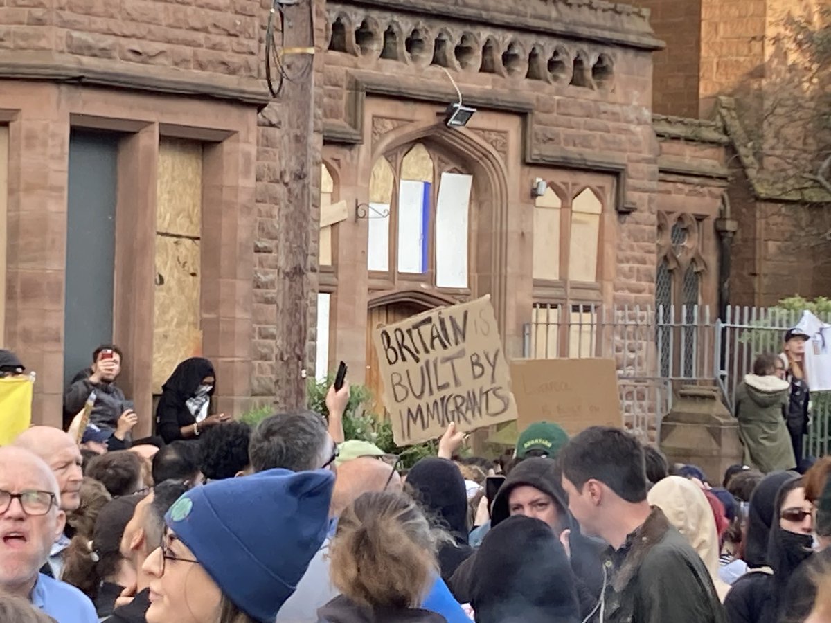 JoshHalliday's tweet photo. Few of the signs on display in Liverpool tonight. Chants of “Say it loud, say it clear, refugees are welcome here” followed by a huge round of applause. https://t.co/0B1FP8W66e