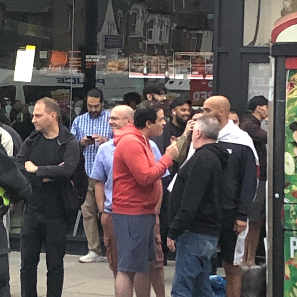 AntiRacismDay's tweet photo. The three far right mugs who have turned up in Finchley arguing what to do next while 2000 antifascists are opposing them 😂

#StandUptoRacism https://t.co/GZ1p2KIai4