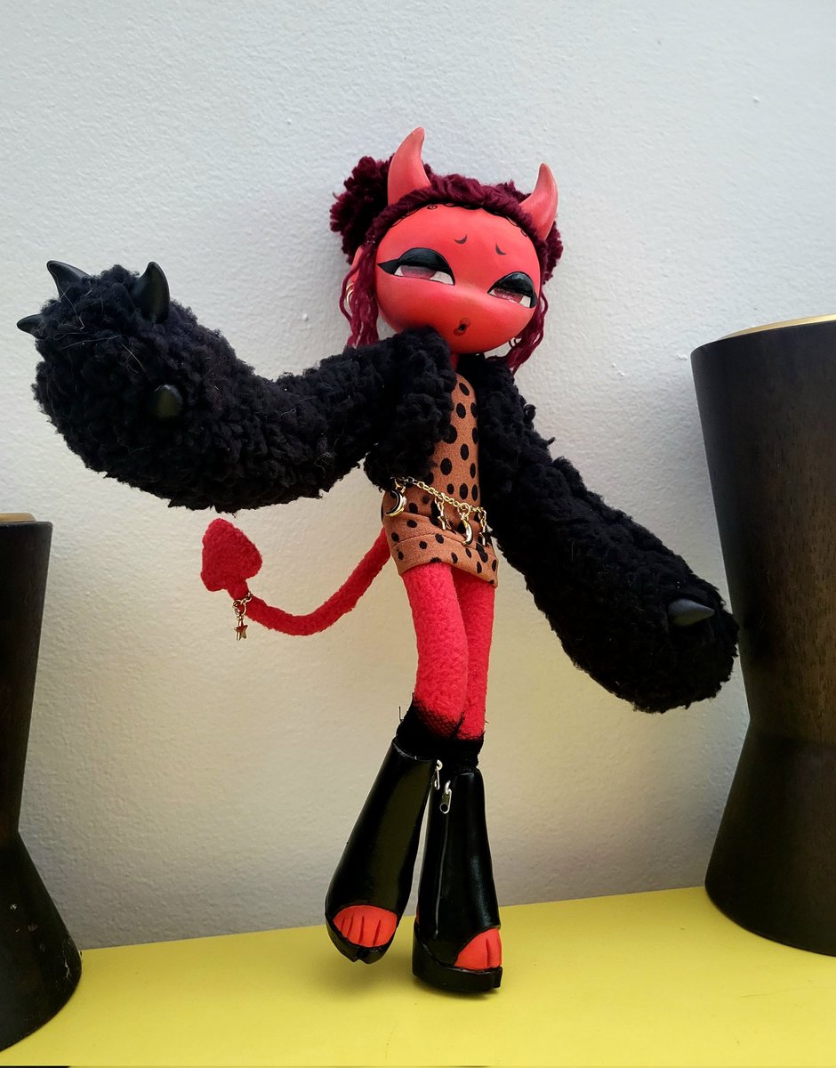 They got groovy wiggly tails! They got horns on their head!

Bad Girl handmade doll