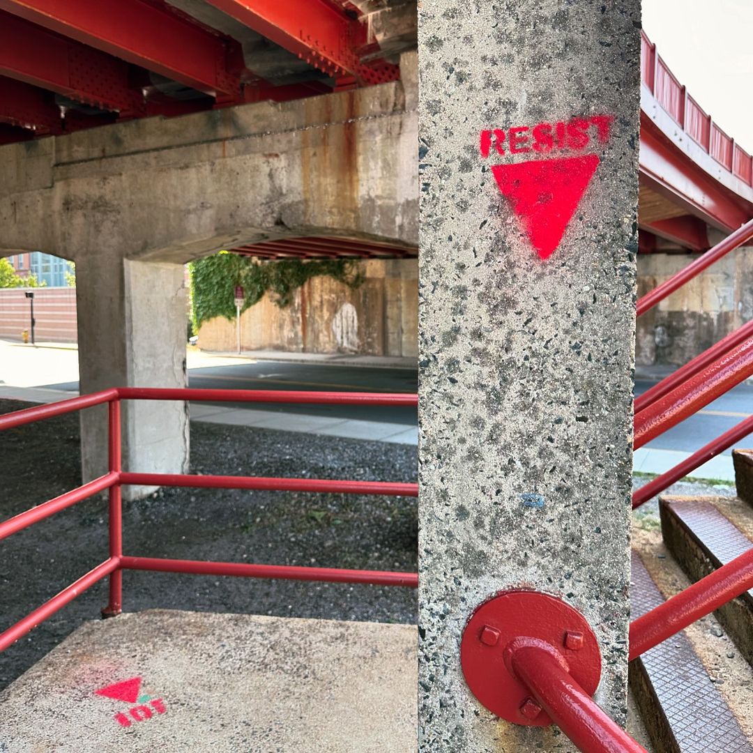 OnlinePalEng's tweet photo. "RESIST" along with the red triangle has been painted on the walls in Salem, Massachusetts.🔻🇵🇸 https://t.co/pFLvpjAWMh