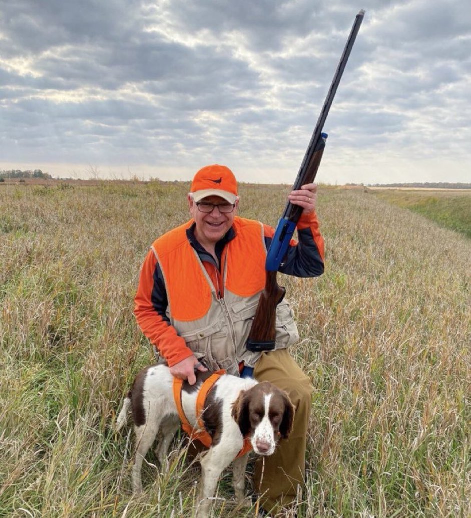 Notice how the barrel of Walz’s gun is pointed away from his dog.