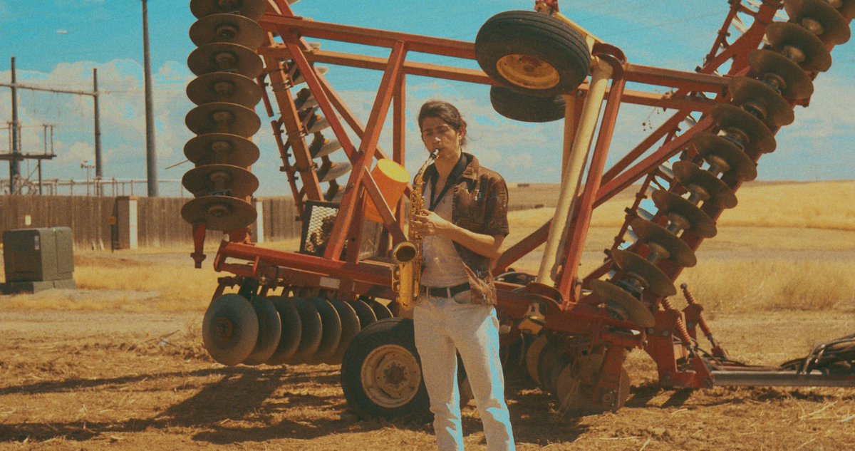 ztbentz's tweet photo. i’m shooting my first music video (for my band while we’re on tour) and i accidentally made asteroid city 2 https://t.co/xAUHLxdEz2
