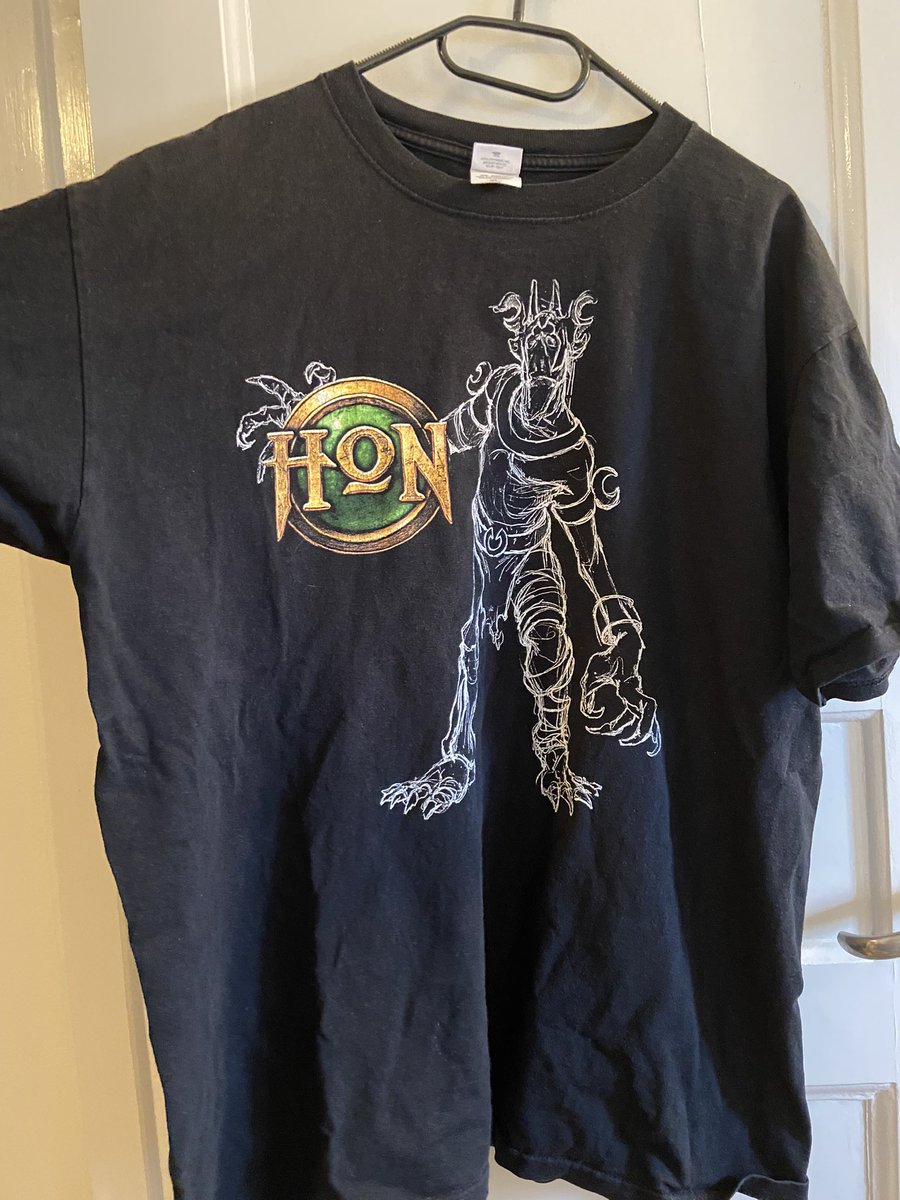 helscribe's tweet photo. Went through my old closet and found this bad boy, could anyone tell me if it’s official merchandise? Anvil Knitwear label on it. 
Possibly bought at @DreamHack in Sweden. 

@heroesofnewerth @S2Games @breakycpk @TobakaZ 
#dota2 #HoN #HeroesofNewerth https://t.co/FkLgaWG8uR