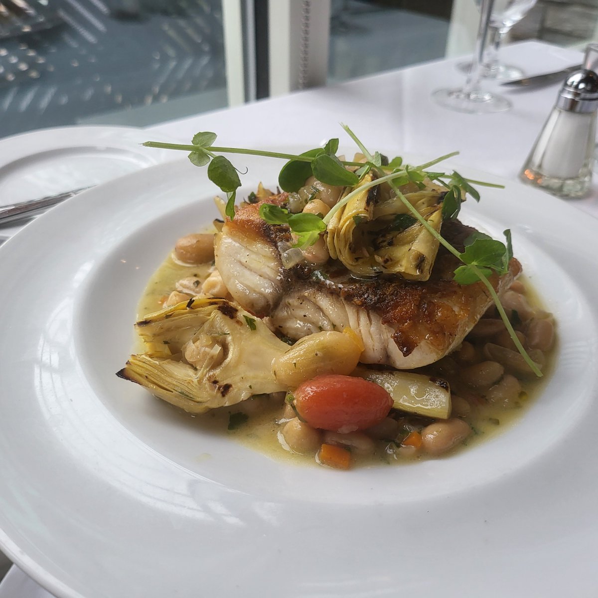 DaviosKOP's tweet photo. Pan seared red Snapper, braised white &amp; garbanzo beans, heirloom tomato confit, grilled artichokes, fresh herbs, extra virgin olive oil feature by Executive Sous Chef Walter Balkiewicz https://t.co/fxpxv4fIh6