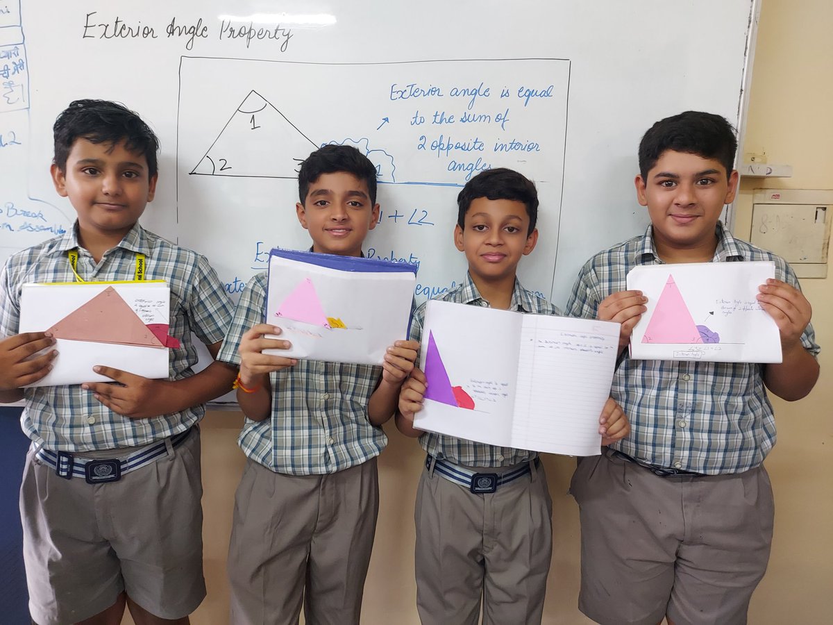 DeeptiSehgal23's tweet image. Bringing geometry to life with hands-on exploration. Ss of #ahlconintl explored the exterior angle property 🔺️ through paper ✂️ @sdg4all @ashokkp @y_sanjay @pntduggal @sunandask21 @harprit_r @renudua89 @Shipra_Srivastv @BahlNamrata @imran_risha #learningwithfun #MathInAction