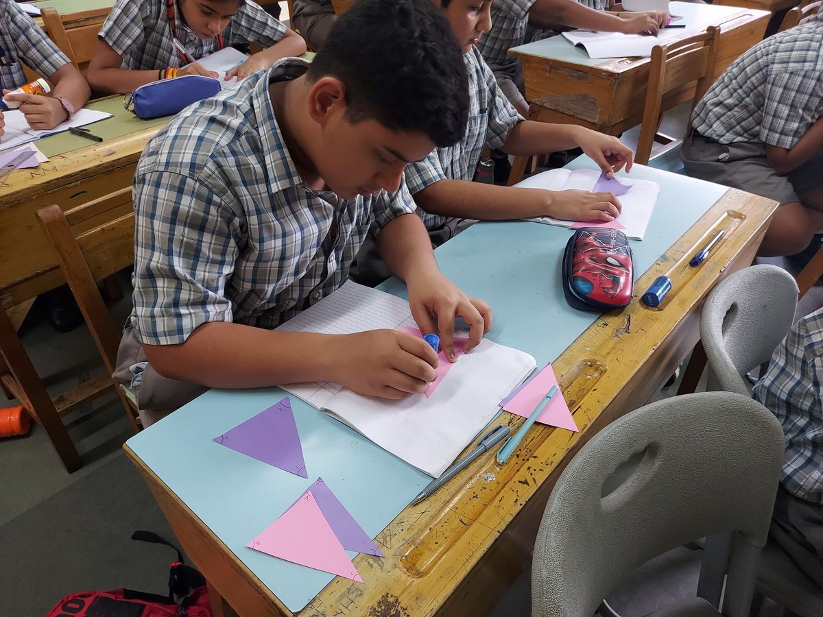 DeeptiSehgal23's tweet image. Bringing geometry to life with hands-on exploration. Ss of #ahlconintl explored the exterior angle property 🔺️ through paper ✂️ @sdg4all @ashokkp @y_sanjay @pntduggal @sunandask21 @harprit_r @renudua89 @Shipra_Srivastv @BahlNamrata @imran_risha #learningwithfun #MathInAction