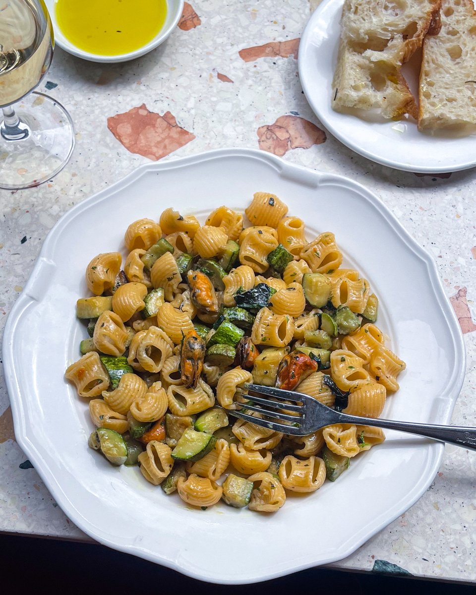 The window seat is perfect for solo dining or an intimate dinner for two. Views overlooking Bermondsey Street and a chilled glass of wine in hand, we leave the windows pulled back. 

This is our conchiglioni pasta served with Brixham Fsh Market mussels, courgettes and mint.