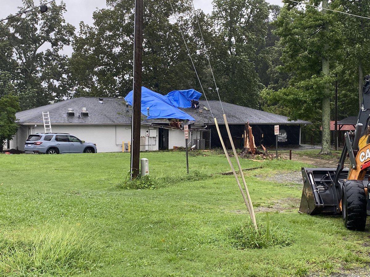 bhallphotog's tweet photo. Crews working to put tarp on roof on building at Gillespie Golf Course. @greensborocity truck was talking away large tree when I pulled up.  @WFMY https://t.co/utmbvOomAo