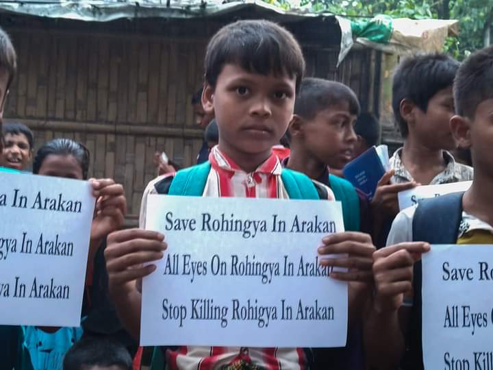 ak_multi_media's tweet photo. #Save Rohingya in #Arakan
Showing solidarity is a piece of human right. This young girl is a student from #Rohingya Refugee camp in #Bangladesh stands with the #Rohingya people in #Arakan, who are being killed by #ArakanArmy
#SaveRohingya
#Savehuman
#Justiceforrohingya
#Burma https://t.co/ZThAlH2EGT