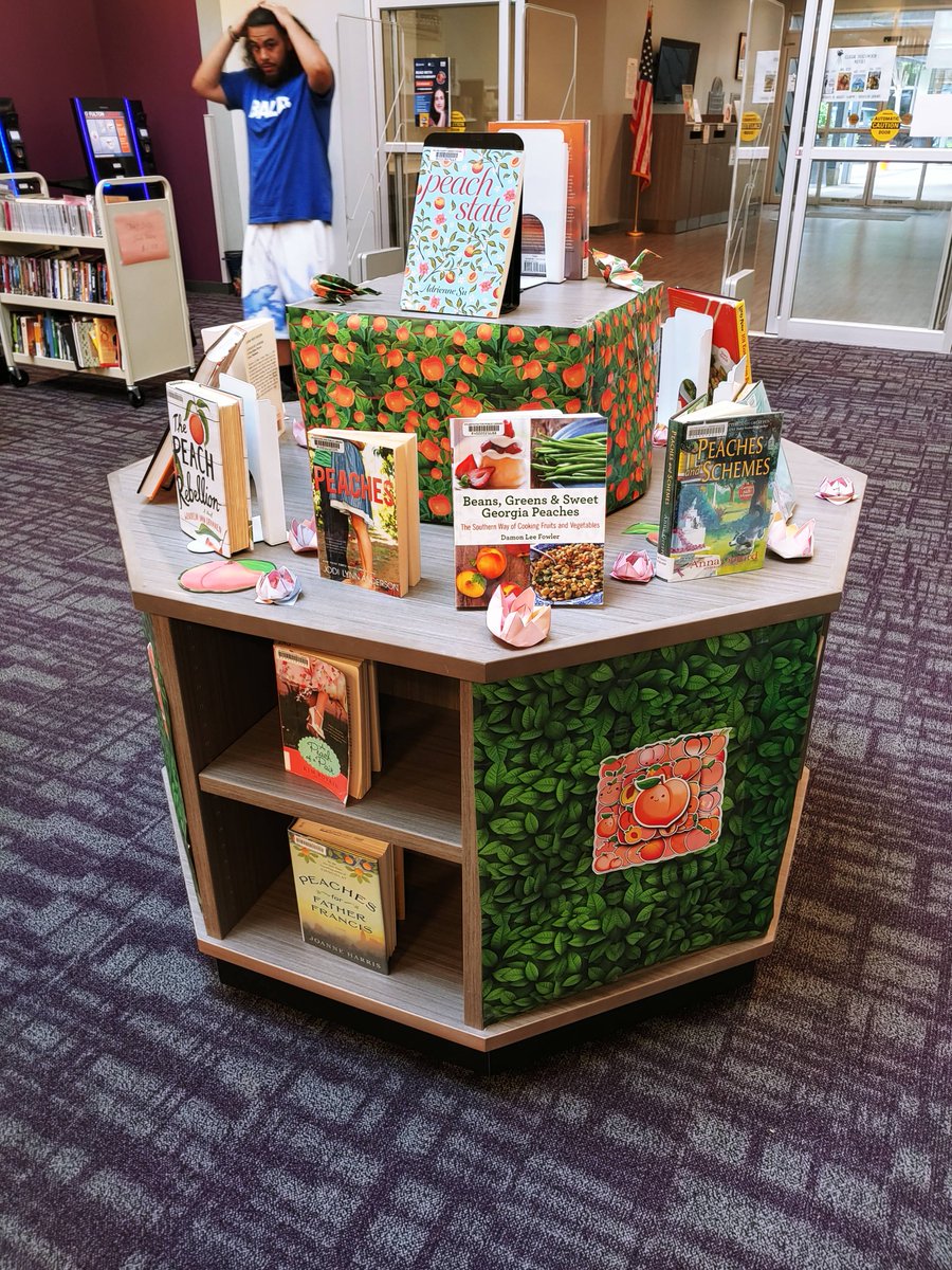 fulcolibrary's tweet photo. It's National Peach Month, and this August, the Buckhead Library is celebrating by offering a delicious peach display for everyone to enjoy. Check it out all month long!

#Fulcolibrary #nationalpeachmonth #georgiapeach #fulcoreads #bookdisplay #buckhead #atlanta https://t.co/Y10s9OA7du