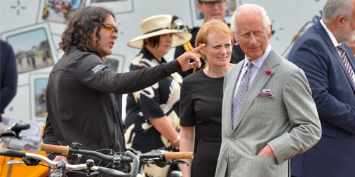 JerseySport's tweet photo. 👑#ThrowbackThursday to when Danny from #CycleWithoutLimits met His Majesty the King during the royal visit to #JerseyCI! We have adapted cycles that enable adults and children with disabilities to enjoy the freedom of cycling.🚲Find out more: https://t.co/S8GyyeMwMc #JerseySport https://t.co/dOxKWNzkaJ
