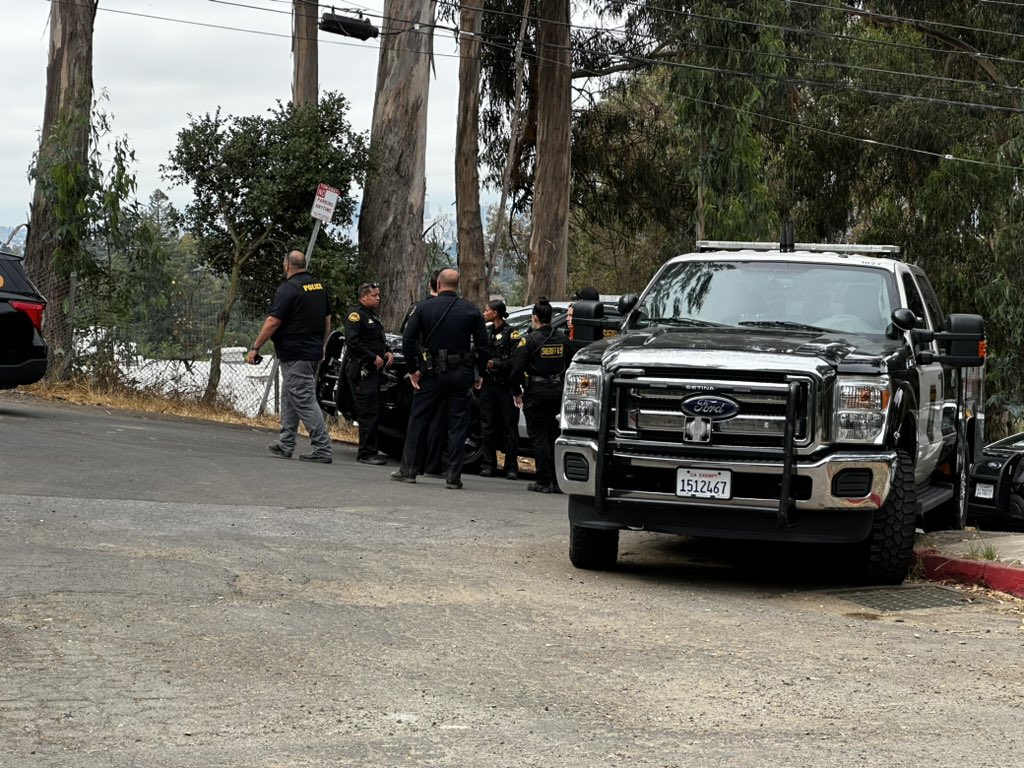 Heavy law enforcement presence at UC after reports of someone shooting up near the track above Clark Kerr.
