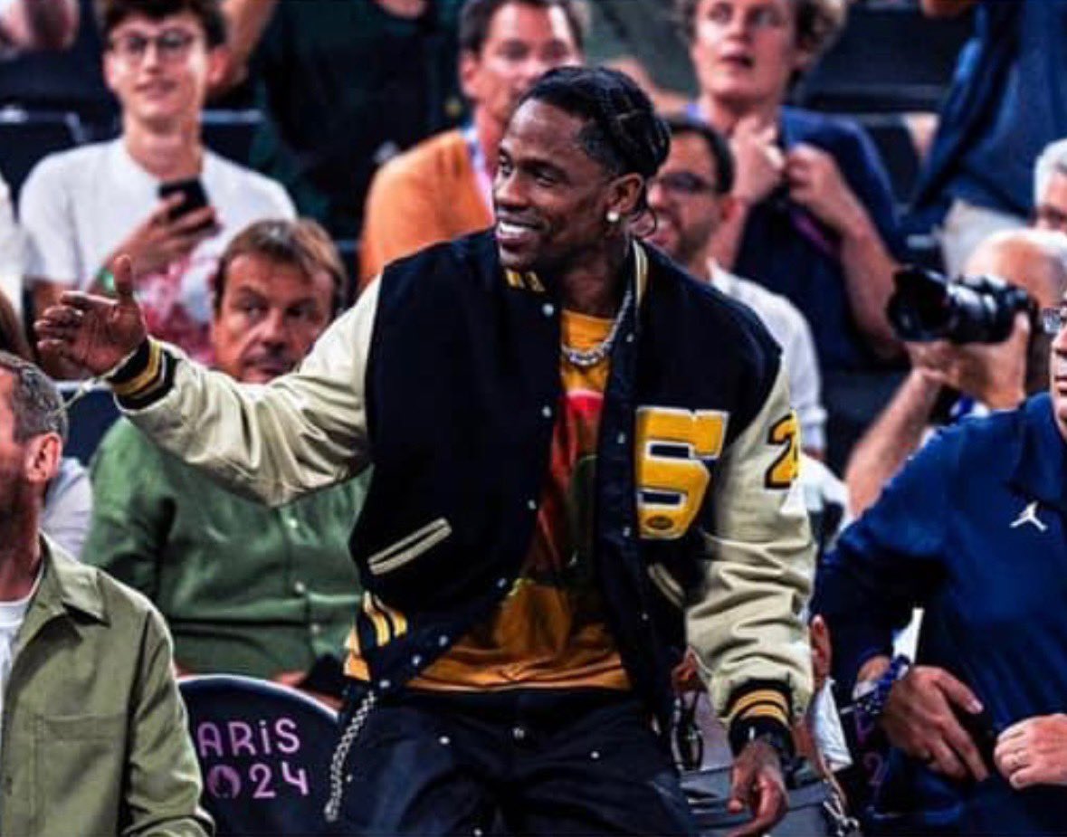 Coach Bobby Klinck🏈 (@coachklinck) on Twitter photo Your school is cool…but is it <a href="/trvisXX/">TRAVIS SCOTT</a> wearing your school’s letterman jacket cool at the Olympics cool? We’ll wait. Your school is cool…but is it <a href="/trvisXX/">TRAVIS SCOTT</a> wearing your school’s letterman jacket cool at the Olympics cool? We’ll wait.
