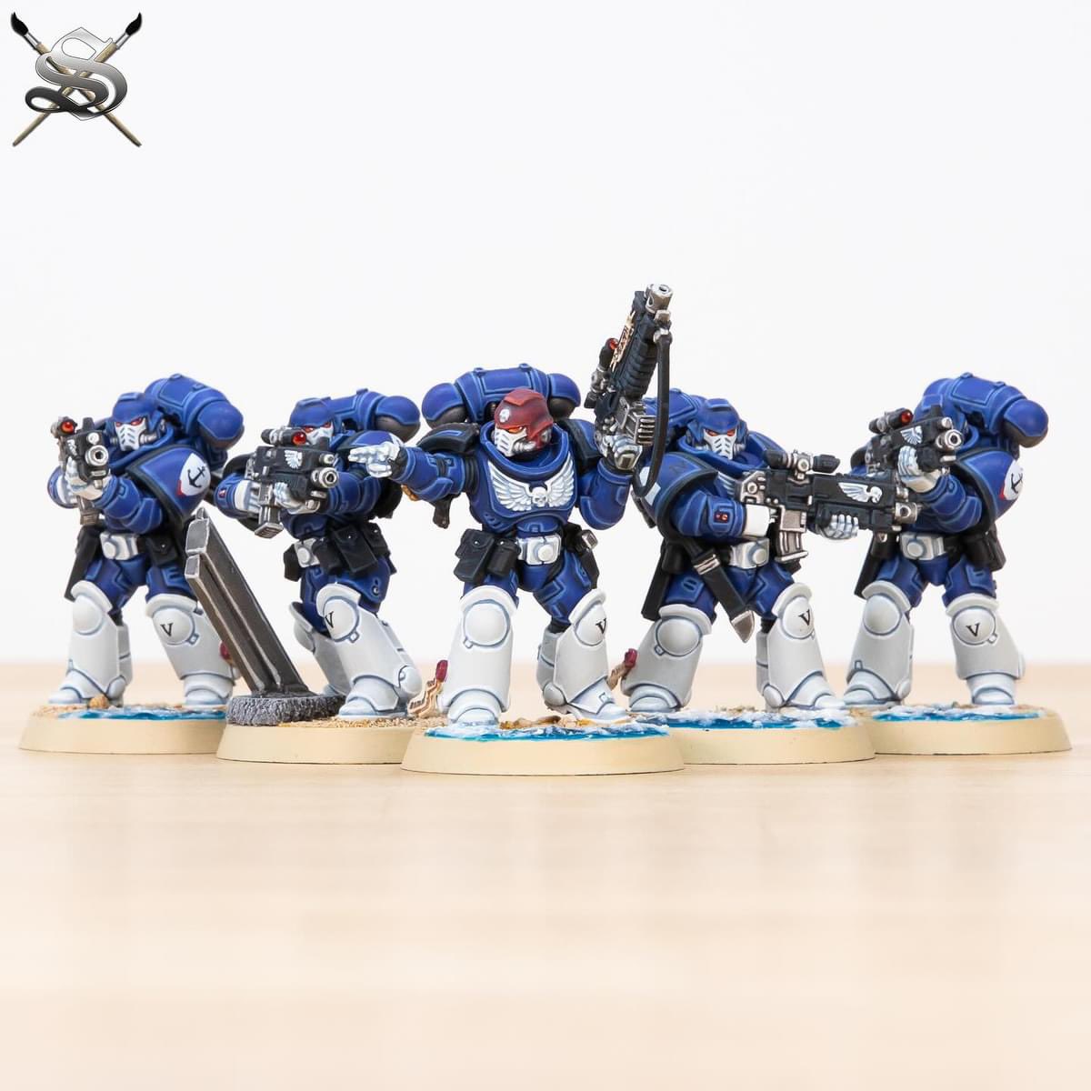 SiegeStudios's tweet photo. Some of the awesome Wave Breaker space marine Intercessors which we painted as part of an army phase of this fantastic chapter!

For a quote or to book your commission:
https://t.co/Nx9uTppy04

The split colour scheme was great to paint and always looks really impactful when sectioned on primary armour sharply. 

The cold white and royal blue work perfectly together to create a vivid and interesting chapter colour scheme with splashes of red as accents. 

One of our favourite parts of this commission was actually the basing setting the scene for this aquatic themed space marine chapter! What is better than a day at the beach for these space marines! 

#primaris #primarismarines #astartes #spacemarines #spacemarine #siegecustomchapter #paintingwarhammer #paintingwarhammer40k #40k #gamesworkshop #warhammercommunity #warhammer #paintingforgeworld #warhammer #wargaming #warmongers #forgeworld #gamesworkshop #miniatures #miniaturemonday #wargames #coolminis #eavymetal #40k