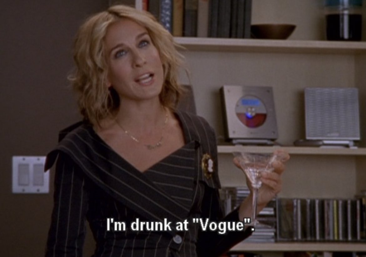 dumbandfunn's tweet image. Carrie Bradshaw getting drunk in the Vogue office while wearing a Vivienne Westwood pinstripe suit set