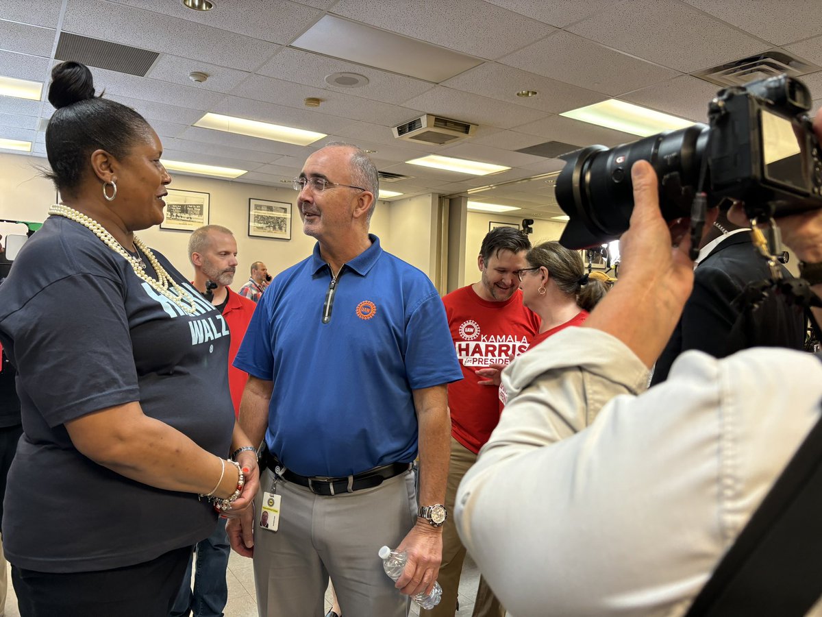 Hello from <a href="/UAW/">UAW</a> Local 900 in Detroit where a crowd is patiently waiting for <a href="/KamalaHarris/">Kamala Harris</a> to appear. UAW president <a href="/ShawnFainUAW/">Shawn Fain</a> here with Region 1A director Laura Dickerson
