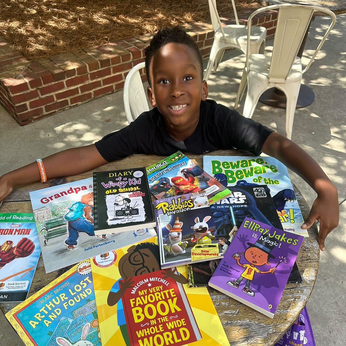 ReadWithMalcolm's tweet photo. Throwback to a favorite reading moment from the summer. 📸 We loved seeing all the creative ways you embraced #READCamp. Share your favorite reading memories with us! https://t.co/9PbXY7hmkK