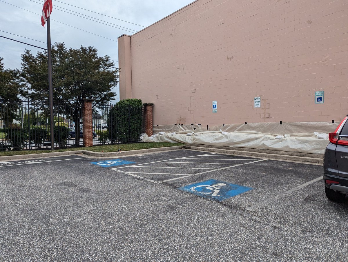 PatrickMcGrady's tweet photo. In order to try to limit damage, crews from City of Aberdeen and Maryland State Highway Administration -- Churchville Office, and Horne Concrete helped to put more than 30 tons of sand in more than 1500 bags all around the two buildings. https://t.co/X9Jx4vrJo5