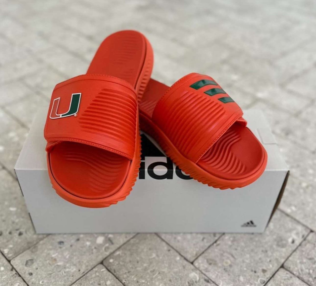 Check out the new Adidas Alpha bounce Slides that just dropped!
Perfect for repping our UM and Canes
Connection pride in style and comfort. We can't wait to get ours! Pick up yours today at MiamiHTS.com or call 305-
284-3244 and step up your game!
