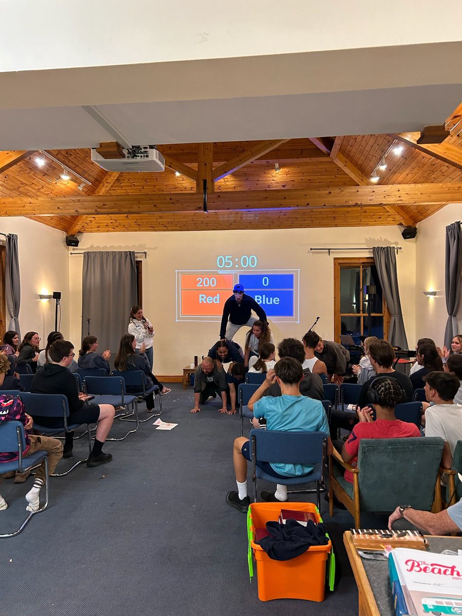 Leaders demonstration of a human pyramid before games night 😂