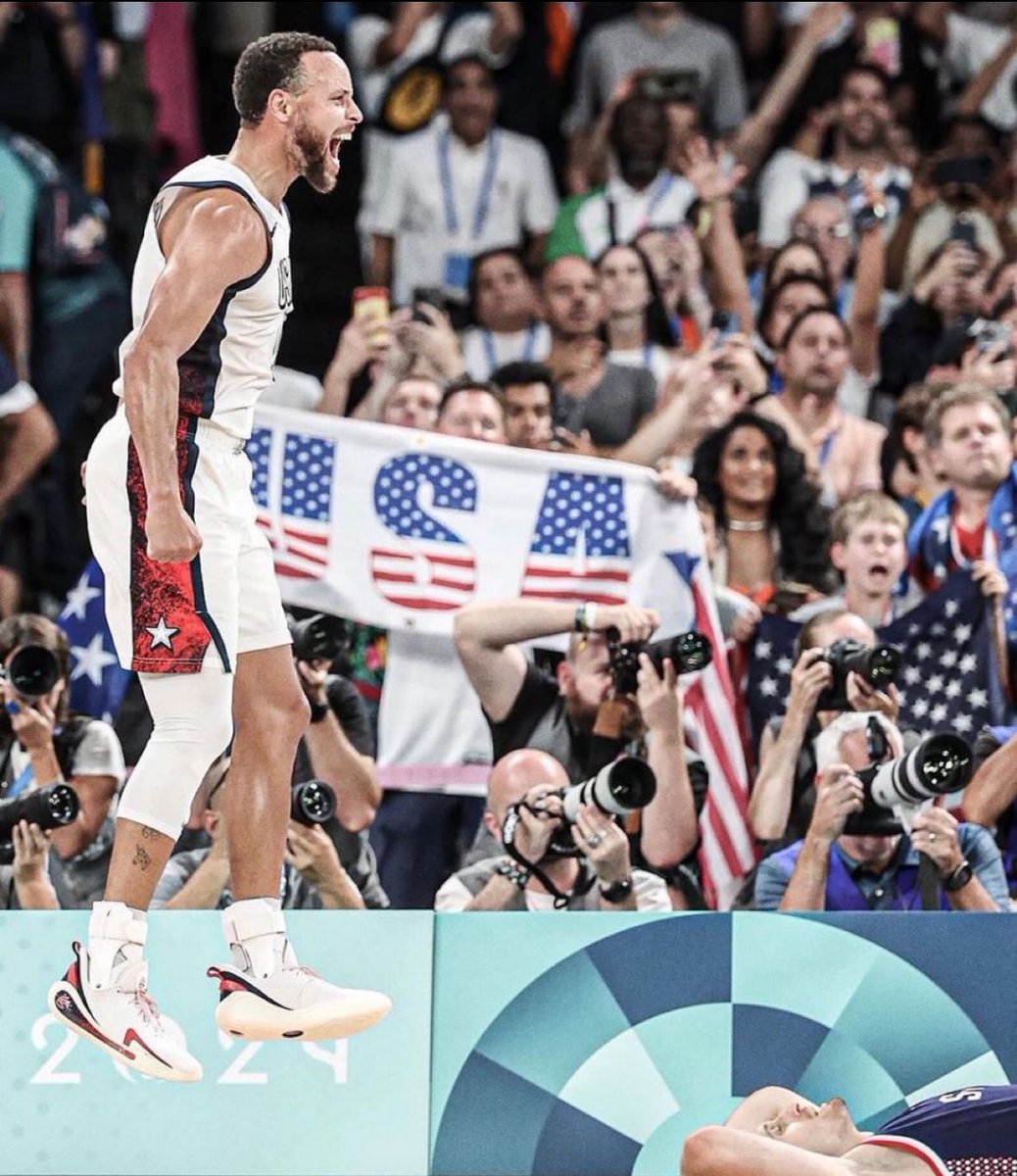 The graphic quality and composition of this photo is unbelievable. It's like a still from a Wes Anderson film.