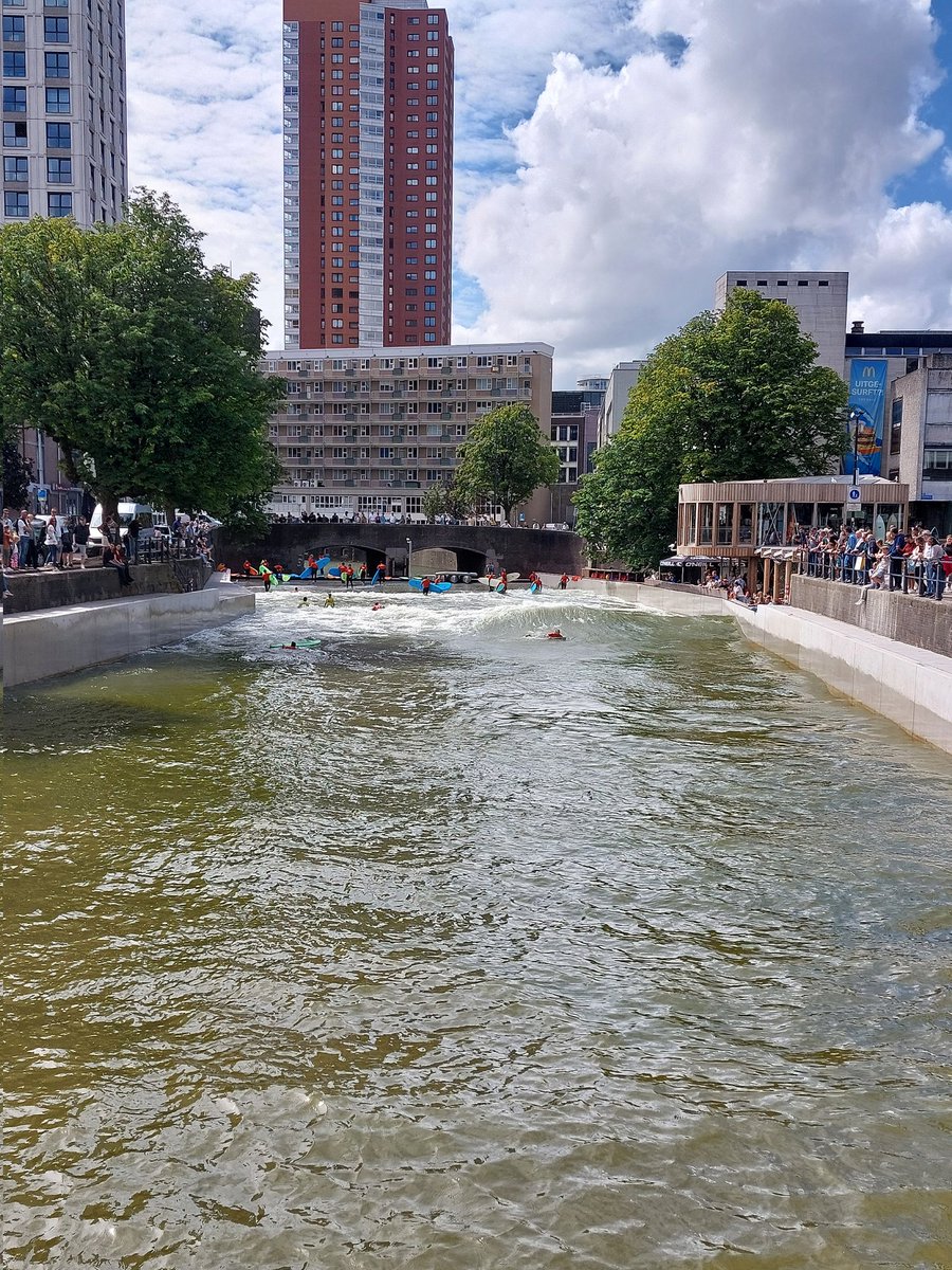 Lunchtime in Rotterdam. A curry, the Pencil and Eraser and watching the surfing through the city centre.