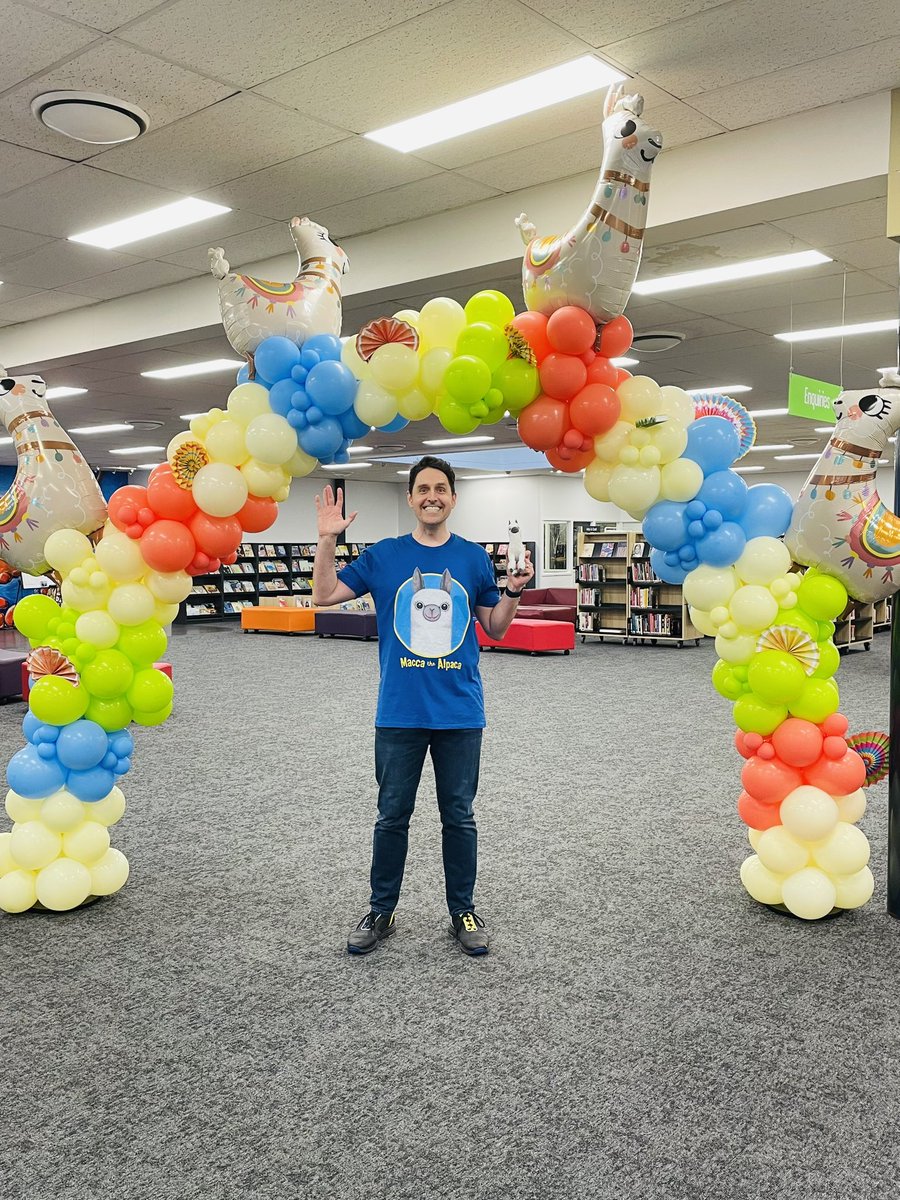 's tweet image. Demanding a giant balloon archway of alpacas for all future author/illustrator appearances! @LibraryGriffith went above and beyond to make me (and Macca!🦙) feel welcome for our early #BookWeek visit talking to 1500 students this week! ❤️📚😃