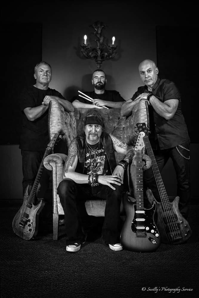 HELLO to you all out there - we can finally introduce you our new full band line up / our band of rock brothers... Ranko, Rich, David and Michael.  We ARE Fugitive and we play Hard Melodic Rock!
Cheers you crazy people - safe travels. X