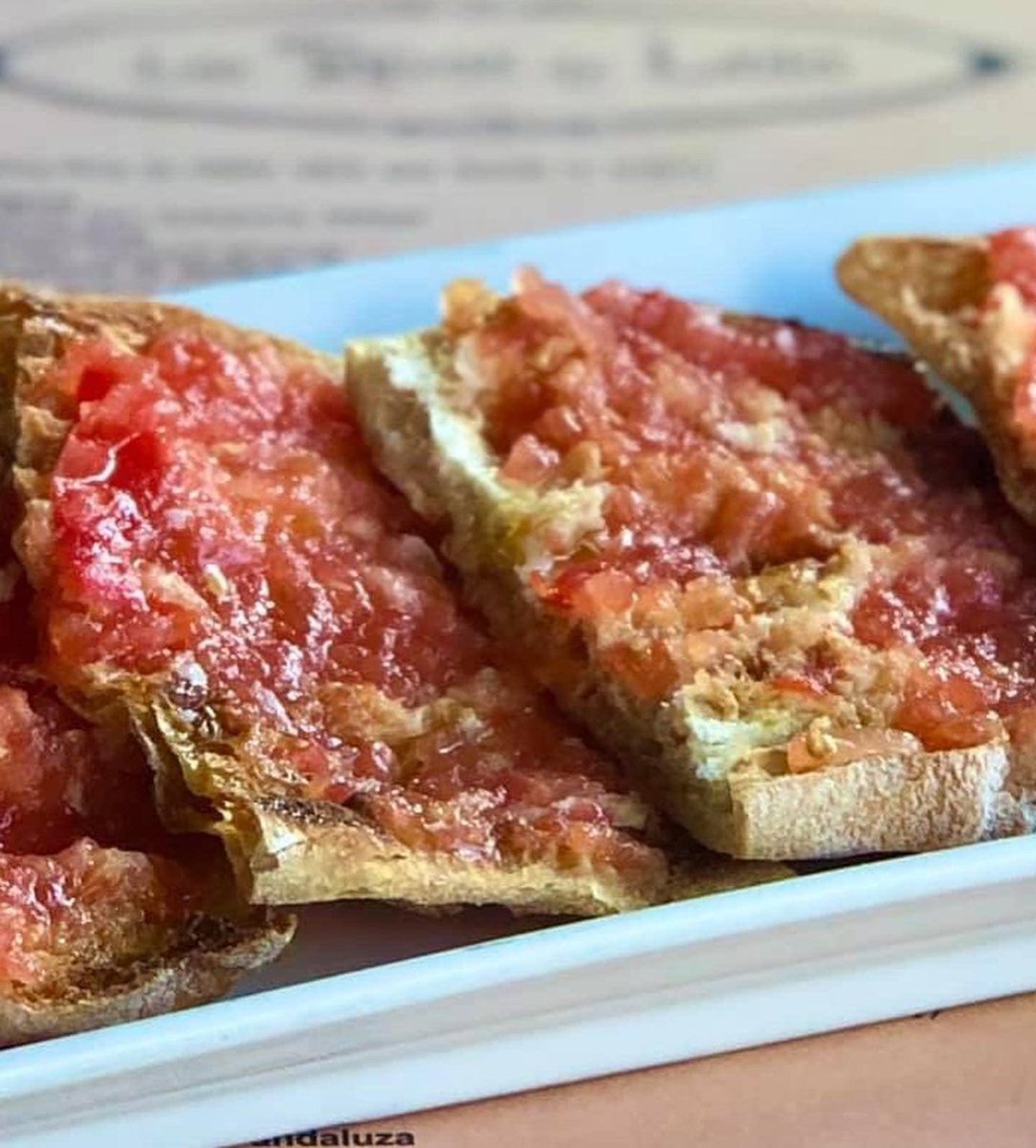 LasTapasDeLola's tweet photo. There’s a reason our #paambtomàquet is such a hit. Our Anna insists on the best of the best #tomatesdecolgar from Spain - the juicier the better ❤️ &amp; delish toasted #pandecristal #oliveoil #seasalt great ingredients = #simplicityatitsbest https://t.co/6iHpat6Dgu