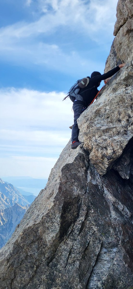 jrdbrt's tweet photo. I have a fear of heights. 

It started when I fell off the glacial northeast face of Table Mountain (elevation 11,111 ft) in the Grand Teton Mountain range at age 18. This past weekend, I took this picture of that glacier on Table Mountain from Lower Saddle of the Tetons.

Several months ago, I hired a virtual nutrition and fitness coach, Cecily Stoddard. It was an affordable option that gave me tremendous flexibility to work around my crazy schedule. I've never met her in person, but she designed nutrition and fitness plans and pushed them to a fitness app to follow. For the first time since high school, I've been doing deadlifts and reverse lunges in my workout routine. I'm in the best shape I've been in since high school.

My supportive wife and best freind, Nicole, went on walks with me constantly. I hiked on trails almost every day averaging about 16,000 steps a day for several weeks. On my hikes in mountains in Idaho and Colorado, I would stand next to cliffs and meditate until I could keep my balance and focus without freaking out. I practiced bouldering. I took a lead climbing course at the local climbing gym.

I talked with experienced climbers that summited the Grand, like Gary Cooper. Gary has summited the Grand over 50 times. He told me there wasn't anything I couldn't do on that climb and I started to believe him. He told me how. One thing he said was to make sure I lather up my parts with Vaseline and leave my fly open for venting. I didn't do that, but I did everything else he told me to do.

Gary said if I could climb the football stadium stairs 20 times in 30 minutes with pack on, I could climb the Grand in 14 hours. I finally made the 30 minute time a week before.

I was the weakest in our group. Two 25-yr old high school friends and hard-core mountaineers, Van Stott Silver and Kesler Hortin. (I'm confident they saved my life about 10 times on that mountain) Then, me and my high school friend Chris Waddell, both from the 1900's. We visited the art gallery in Jackson Hole before we hit the trail and Chris gave me a lesson in the arts. I was inspired for the trek. He's a brilliant artist and sculptor, one of the most talented and kind people I know.

Somehow we made it. It took a humbling 22 hours. There were many moments I felt like we were in big trouble. Like when I had to stretch around a boulder, gripping with my fingers and toes as I scooted around the Belly Roll hanging out over a 2,000 ft vertical cliff. (see photo) We prayed focused and fought through the challenges one at a time. I knew my family was praying for me. I had studied hours of videos and read books about the climb and still with all the preparation, I had to experience it all to know it.

@jimkchin was on the summit with his daughter and Jimmy smiled at me while I was stepping up. As if I made it to heaven and God was smiling at me to say, "See, I told you it would be worth it." It was surreal at the summit. I wept for 10 minutes as I looked down at Teewinot Mountain (elev 12,330 ft). The Grand Teton ascends to 13,775 ft).

I'm not scared of heights anymore.