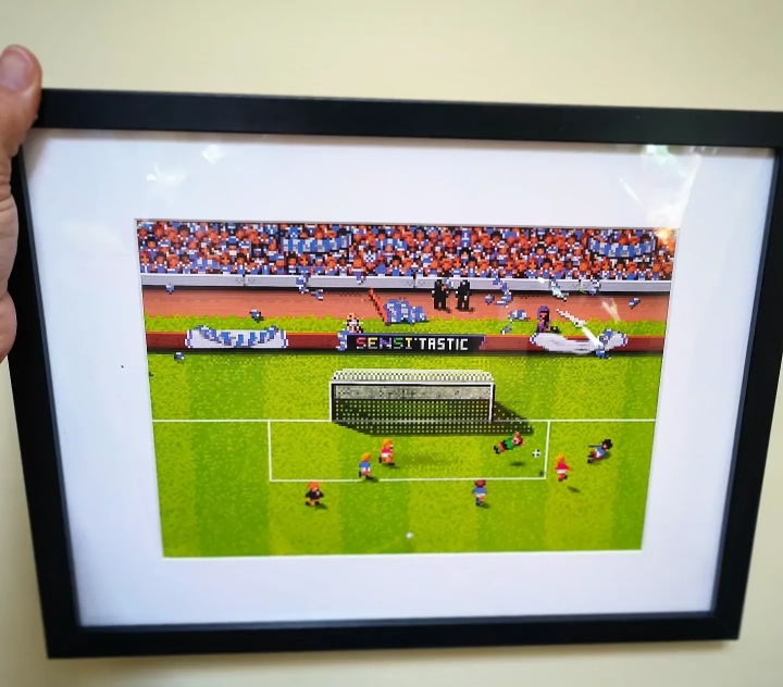 StooCambridge's tweet photo. This is a one off framed print on canvas I'll be bringing to #zzaplive2024

It's Soccer'tastic!

Come say hi if you're attending next weekend!
17th August at Holiday Inn Kenilworth.

@design_droid

#thedesigndroid #artprint #canvasart #artistlife #sensiblesoccer #swos #Amiga https://t.co/LHh2Lqppqu