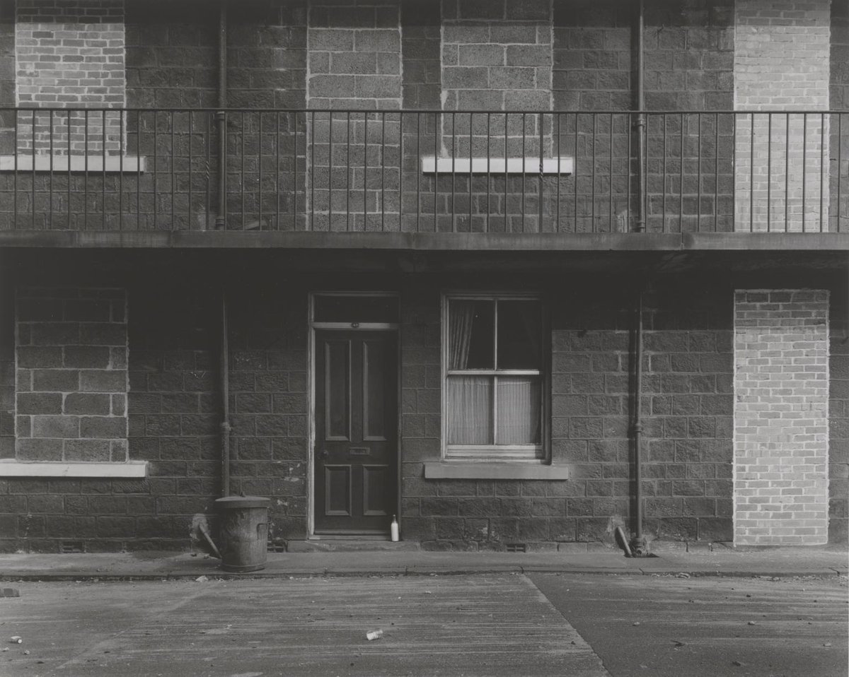 Chris Killip explores how bricks can be used to block access. This photo shows the bricked up windows of terraced houses, that close inhabitants in and shut outsiders out. 🚫 

📷 See this work, Isolated Tenement 1974, in our free #Brickworks display. bit.ly/4d1L6D1