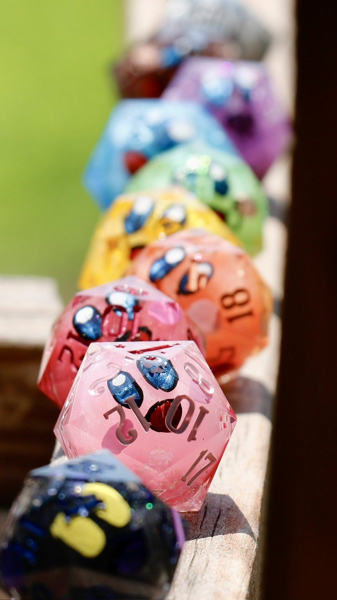 interstellarD20's tweet image. I’ve made a lot of Kirby dice in the past, but they’ve all been pink. No longer!! (And I just put them up for preorder, so come get yourself a colorful Kirby liquid core)