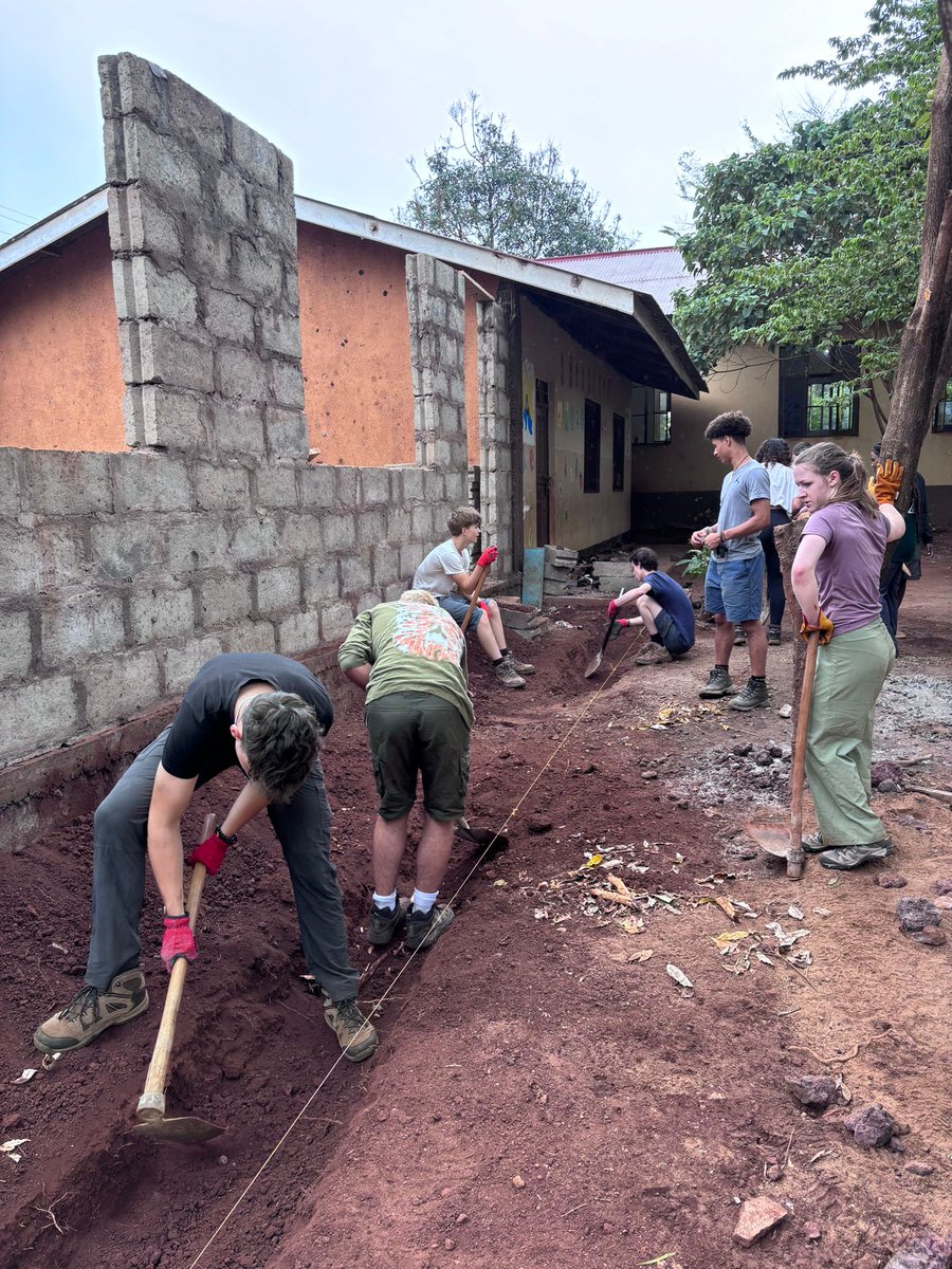 camptanzania's tweet photo. #TeamStroberi have moved to #CampMbokomu for their last few days. 🥰 The teams most recent project efforts see them visiting a local school helping build a classroom! 🏫 We can't wait to see what the team get up to in their last few days in country! ❤️ #campseffect @campsint https://t.co/bE4h7dBMvB