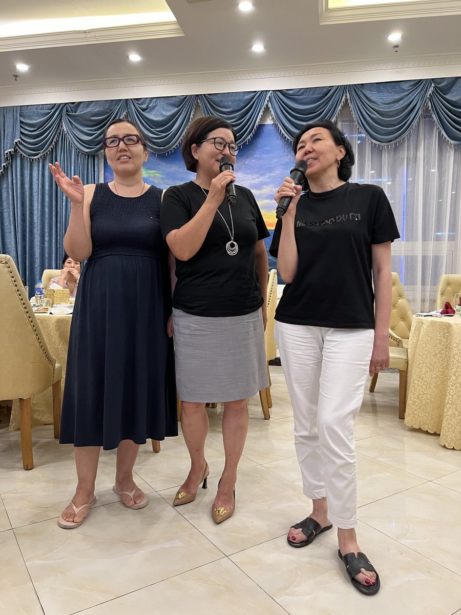International sisterhood. Mongolian and Kazakhstani feminist economists sing karaoke in Russian.