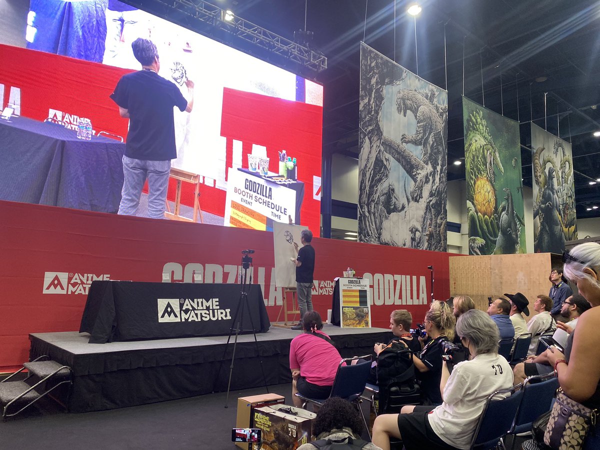 DMan1954Gojira's tweet photo. The stunning Godzilla artist @MASH_nishikawa is doing a live painting at the Godzilla Store right now @AnimeMatsuri! #Godzilla #AnimeMatsuri #AMGodzilla70 https://t.co/5anChv8PfZ
