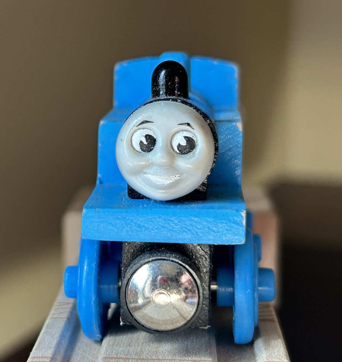 Tangent_Thomas's tweet image. Proof of concept prototype Thomas engine for the Wooden Railway 10 Years in America pack. 

This Thomas is identical to a normal 1999 release with mouth and eye details painted on, similar to the one used for the product photos. The final release also had a plastic smokebox.
