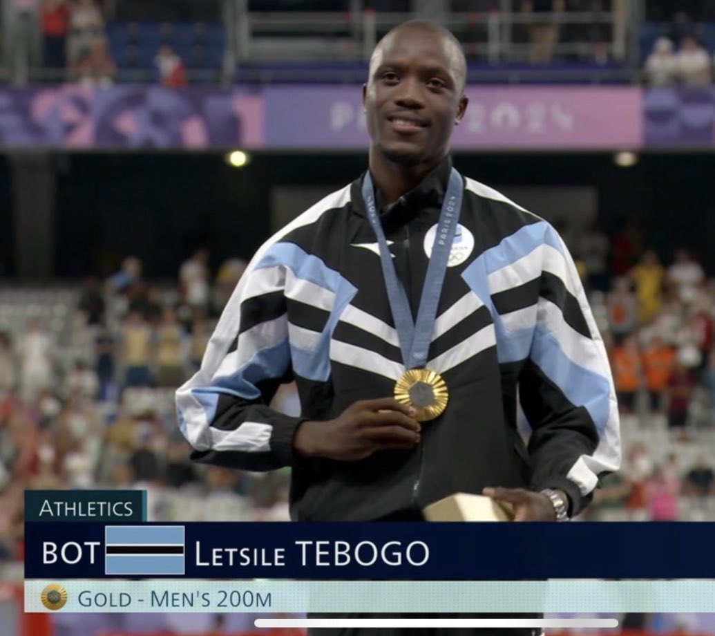 jackkenmare_'s tweet photo. Can we just talk about Botswana’s podium jacket at the Olympics. That is sensational https://t.co/PR9maQQm6r