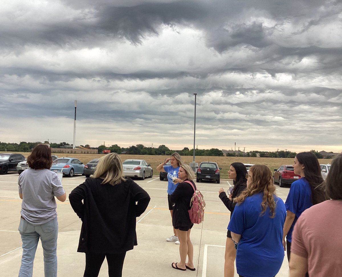 lesleerupp's tweet photo. These creatively constructed clouds provided a conveniently cool canopy for our #carline crash course this morning, lead by @paigeschrapps @FurrElem. @McNattMcnattc was especially enthusiastic about ensuring the system is smooth, #safe, and speedy. #hustleandheart #firstdayprep https://t.co/yPOr1zsOWI