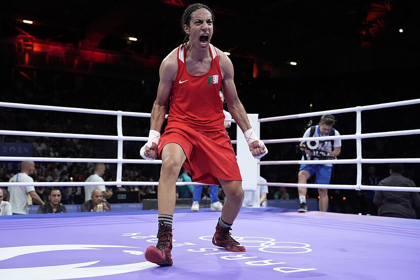 WallStreetMav's tweet photo. 🚨𝐁𝐑𝐄𝐀𝐊𝐈𝐍𝐆:  male boxer Imane Khelif just won Gold by beating Chinese female boxer during the Paris Olympics. 

The Algerian boxer, who has male XY chromosomes, beat Chinese female boxer Yang Liu.

Imane Khelif has failed multiple gender tests and has been banned from women's professional boxing, but was allowed to compete in the Olympics.