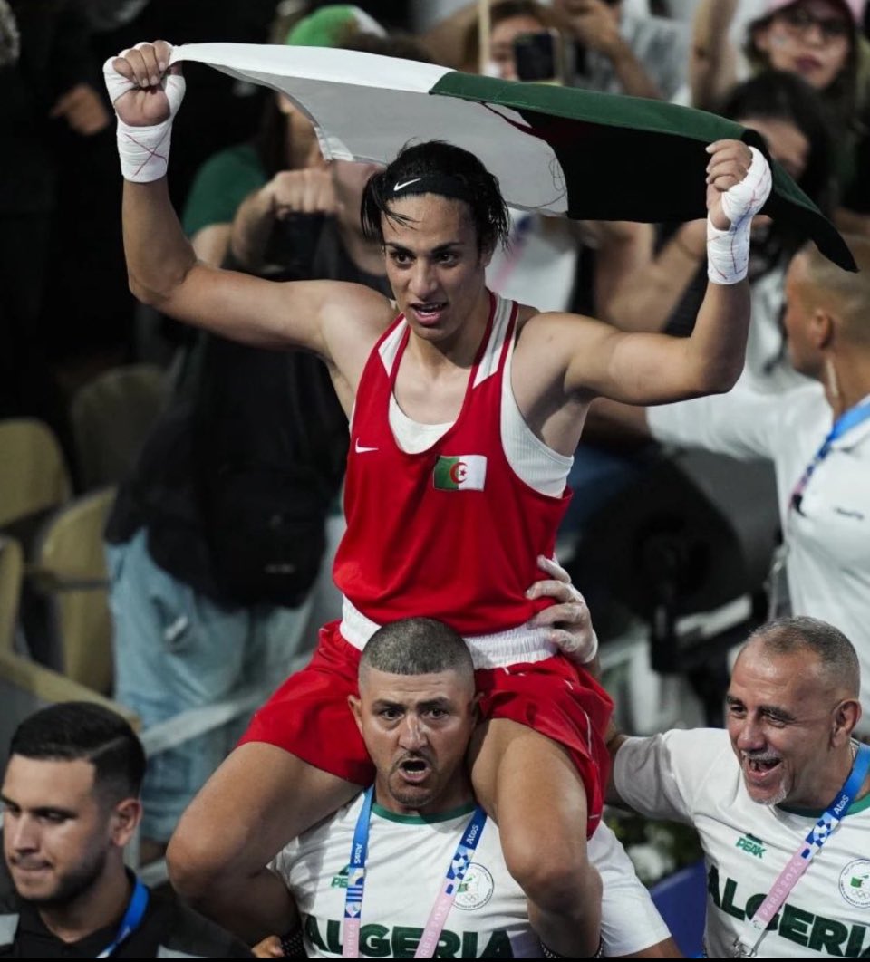 I have just seen it said on Facebook that it would be completely unacceptable for an Algerian woman to be carried like this on a man's shoulders- I mean COMPLETELY unacceptable! 
Can anyone in the know throw light on this please?